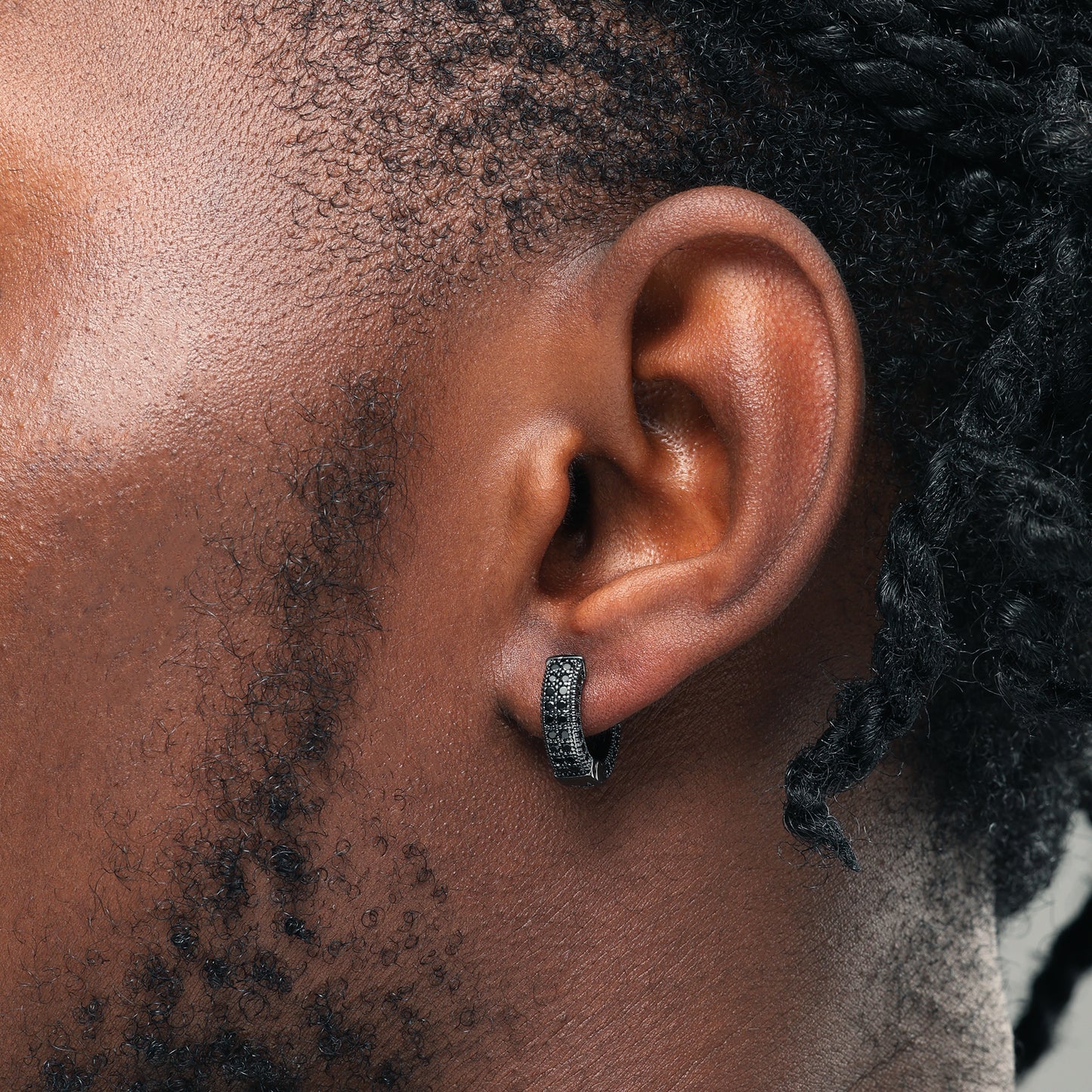 CZ Stone Iced Hoop Earring In Black Gold
